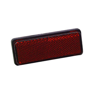 Réflecteur rouge derrière HUSQVARNA