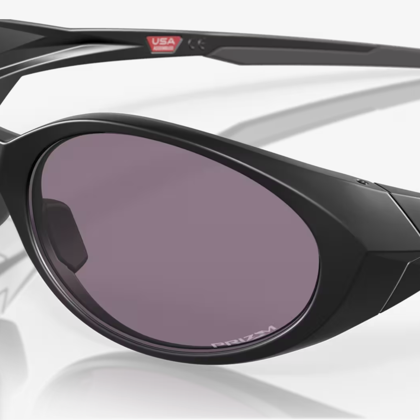Black sunglasses with a reflective surface on a white background