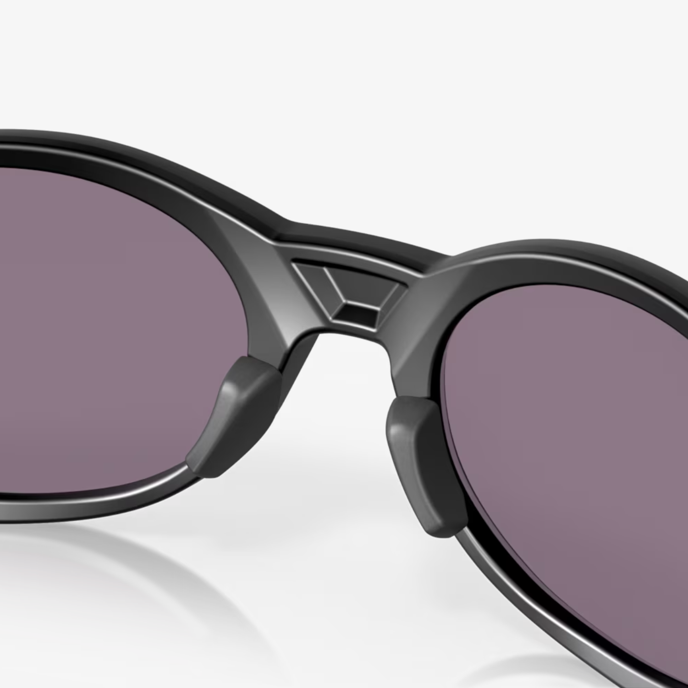 Black sunglasses with dark lenses on a white background