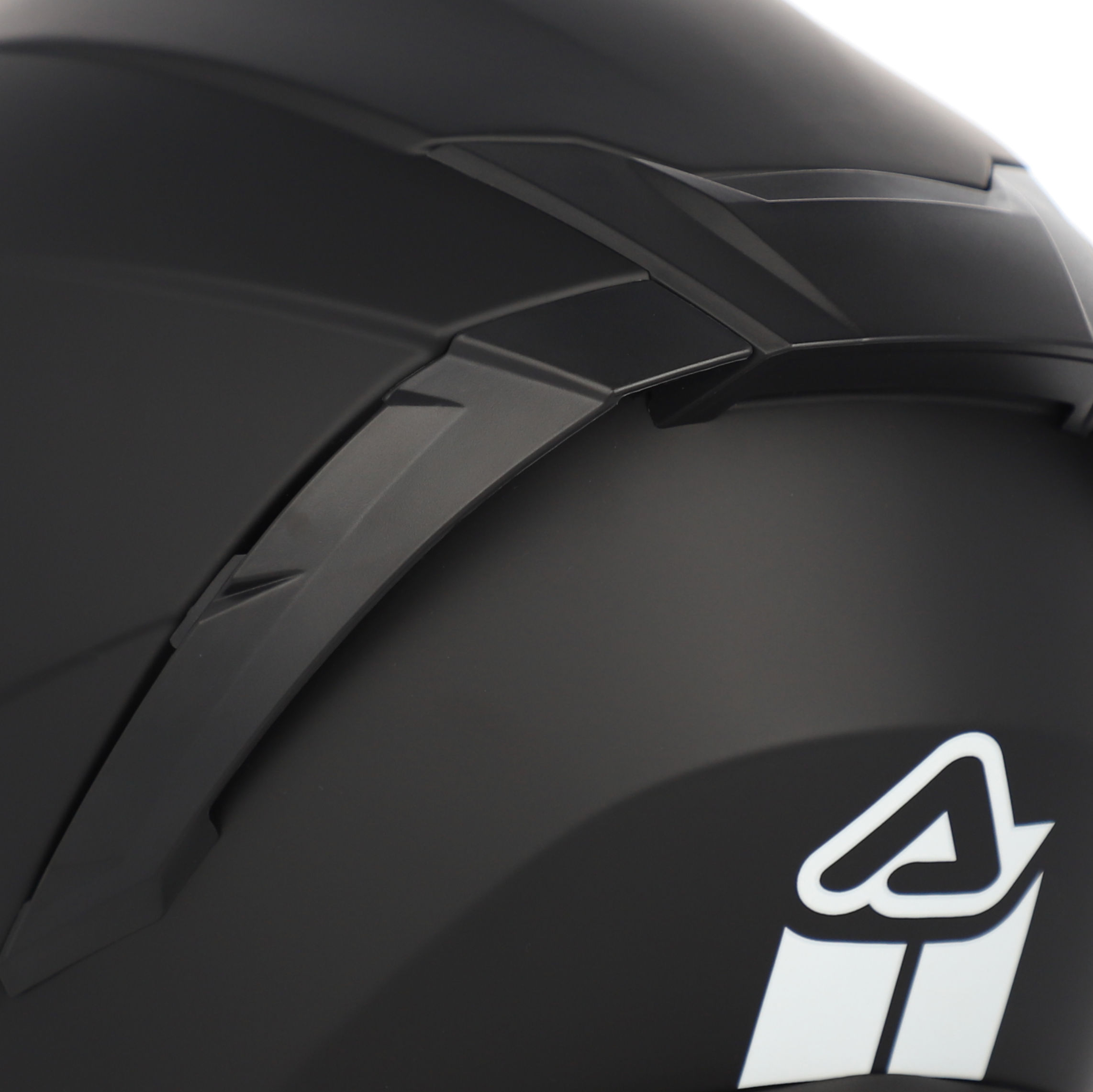 Black motorcycle helmet with a logo on a white background