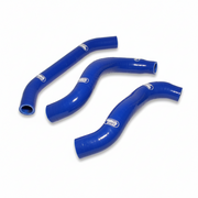Three blue silicone radiator hoses on a white background