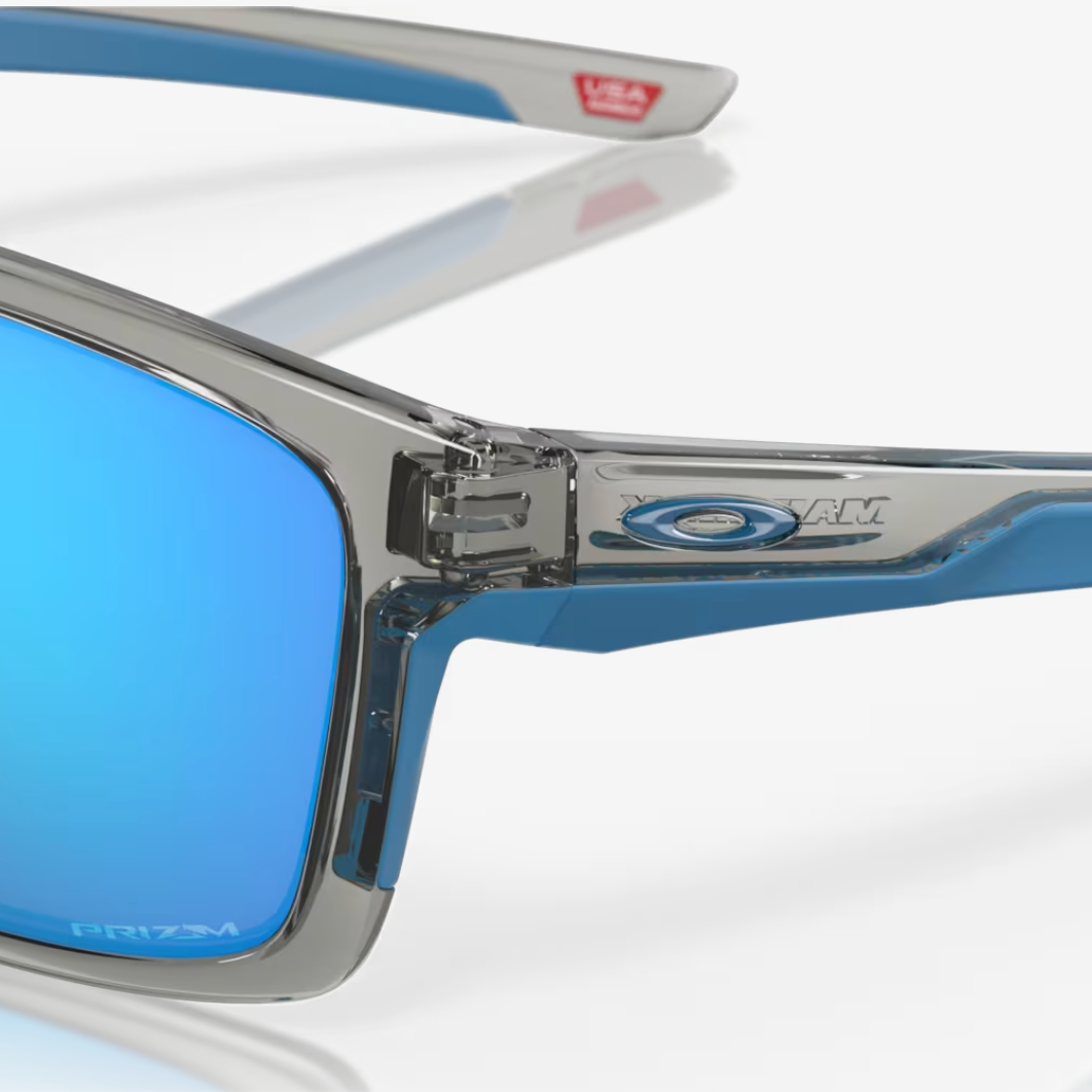 OAKLEY zonnebril Mainlink grijs inkt met zwarte saffier