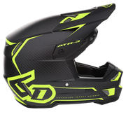 A black full-face motocross helmet with a carbon fiber pattern and bright neon yellow-green graphic accents, shown from a side profile on a white background.