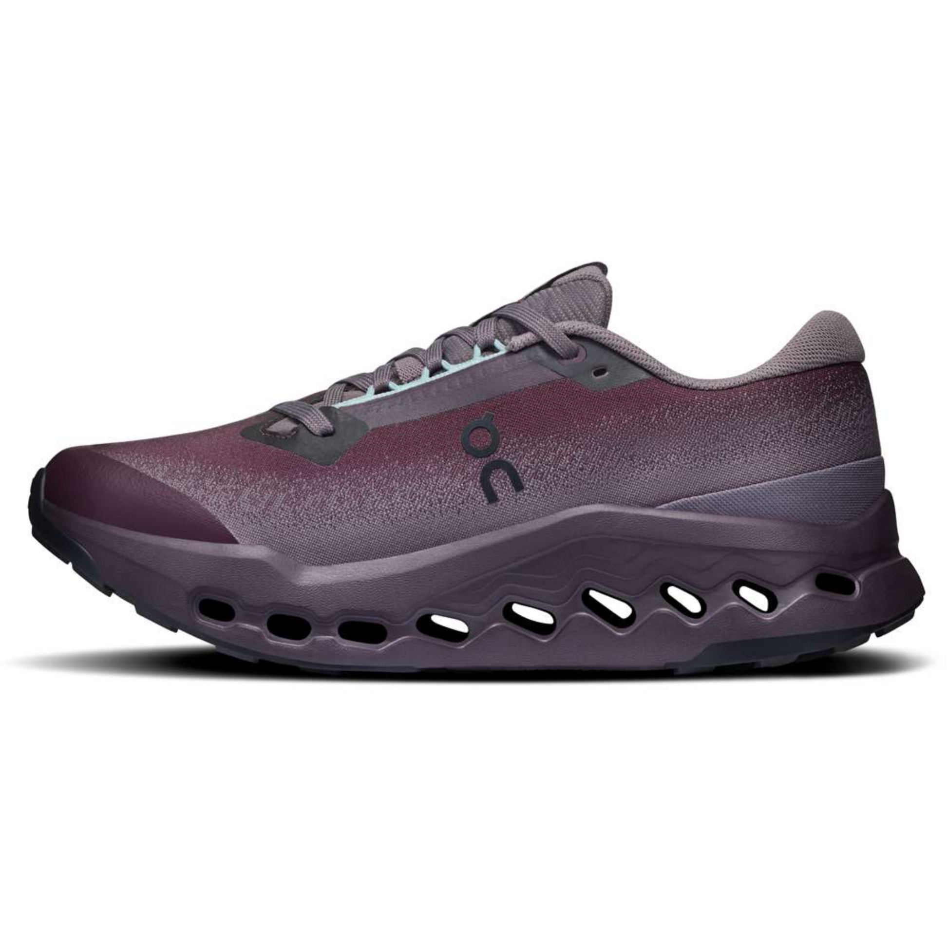 Purple running shoe with a unique sole design on a white background